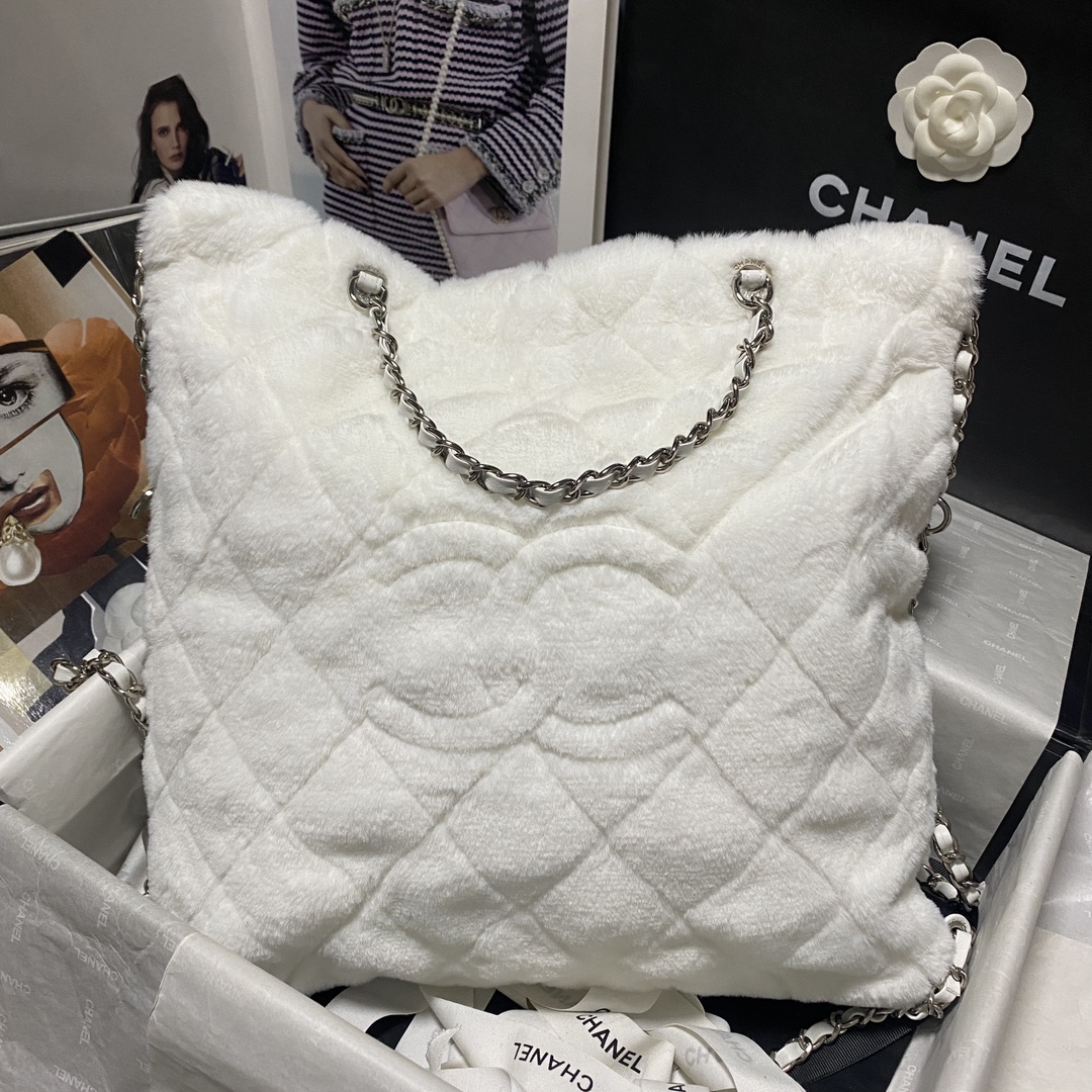 샤넬 23FW 코코네쥬 시어링 백팩 화이트 블랙 AS4278