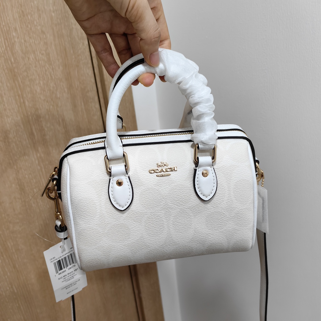 코치 미니 로완 크로스바디 백 CS183